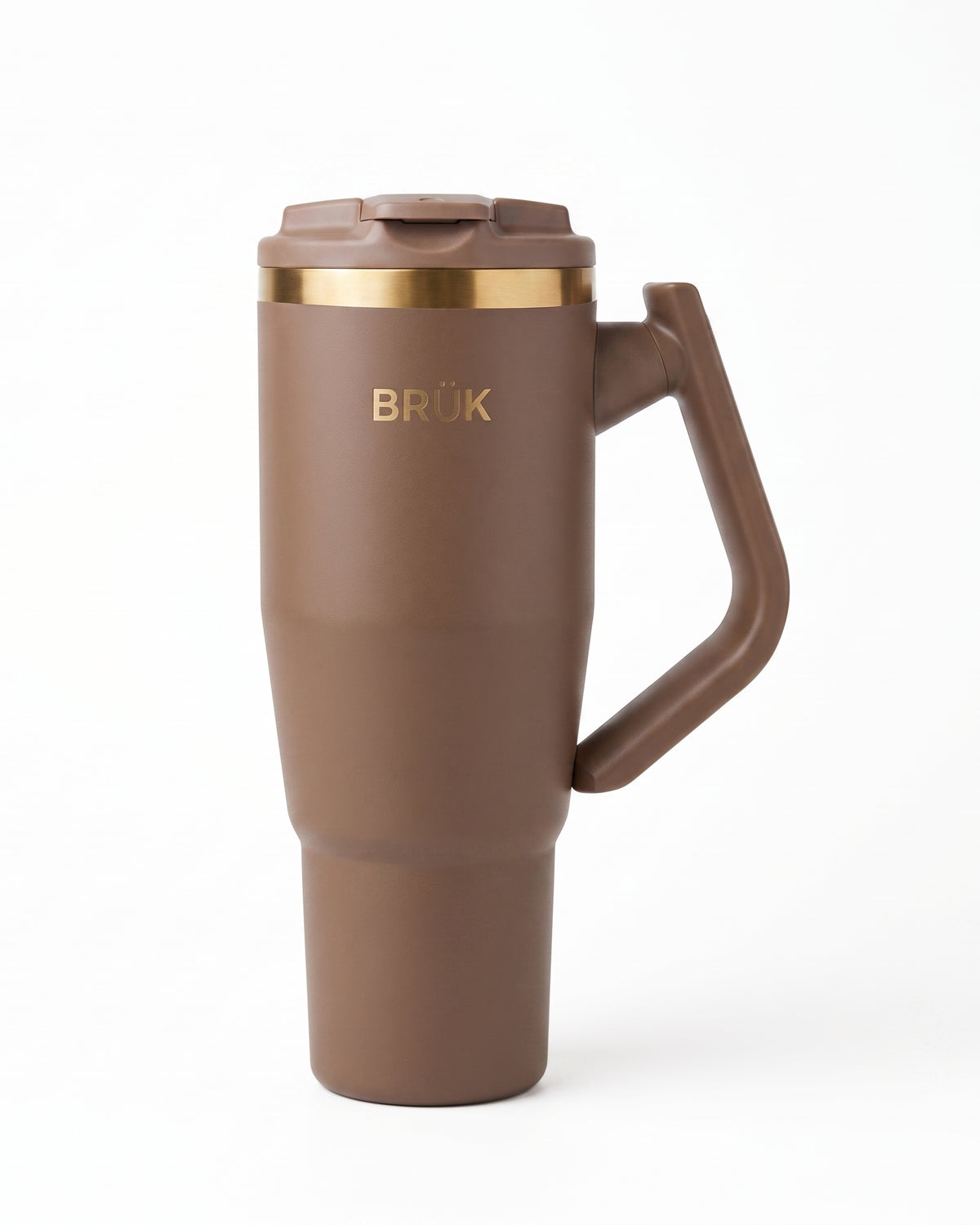 A matte brown travel mug with a matching handle, lid, and a gold metallic band around the neck, featuring the gold 'BRÜK' logo on the front, set against a plain white background.